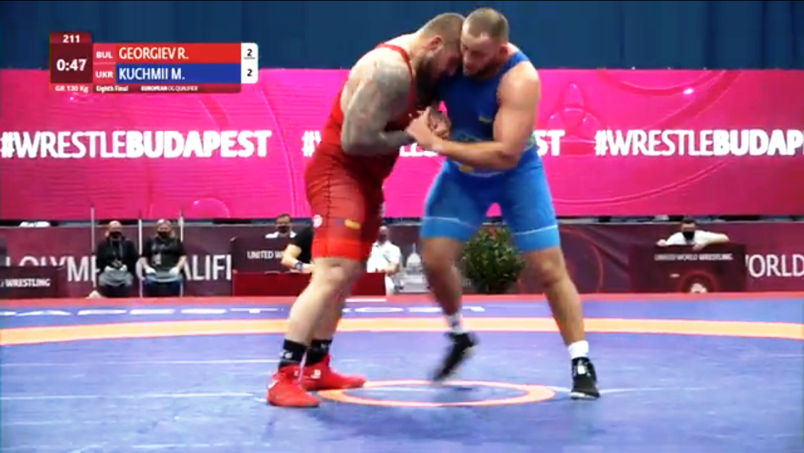 Микола Кучмій (у синьому трико)